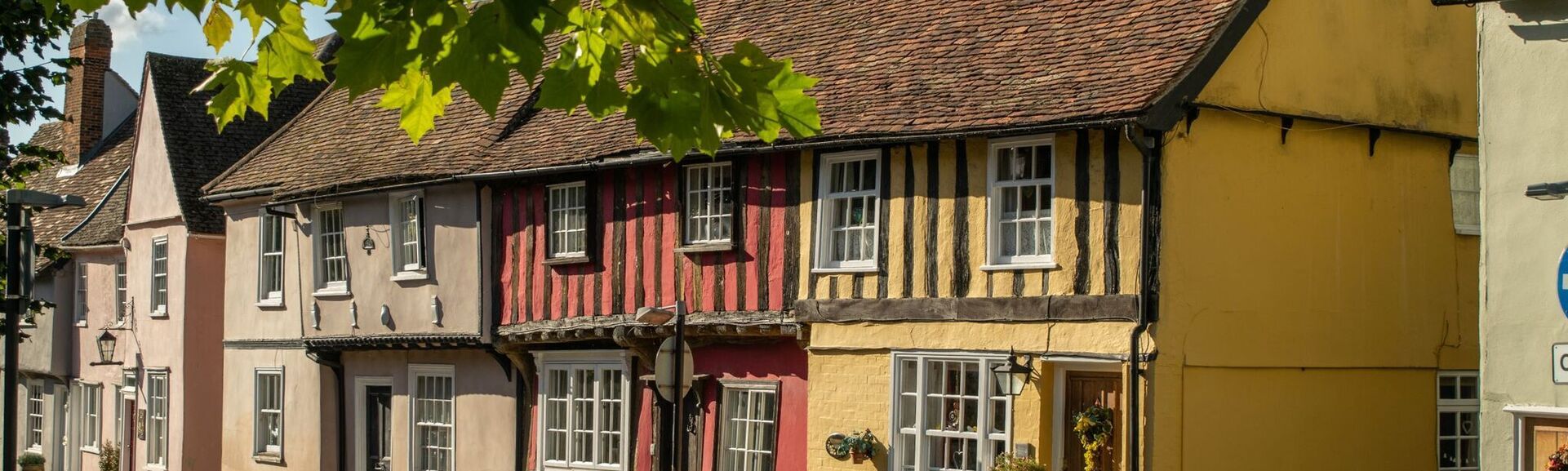  old colorful Tudor timber framed British cottages at Saffron Walden