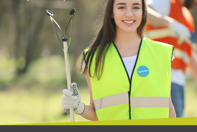 Someone holding a litter picker for Litter Picking Week