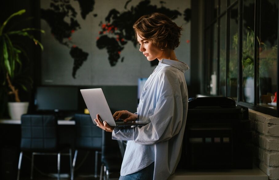 A person looking at their laptop