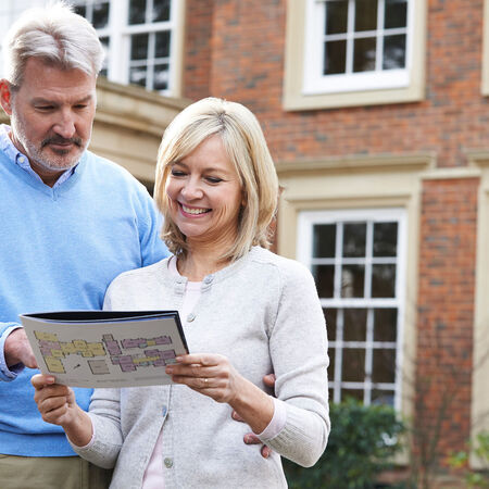 Couple looking at property details